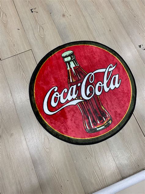 round coca cola rug
